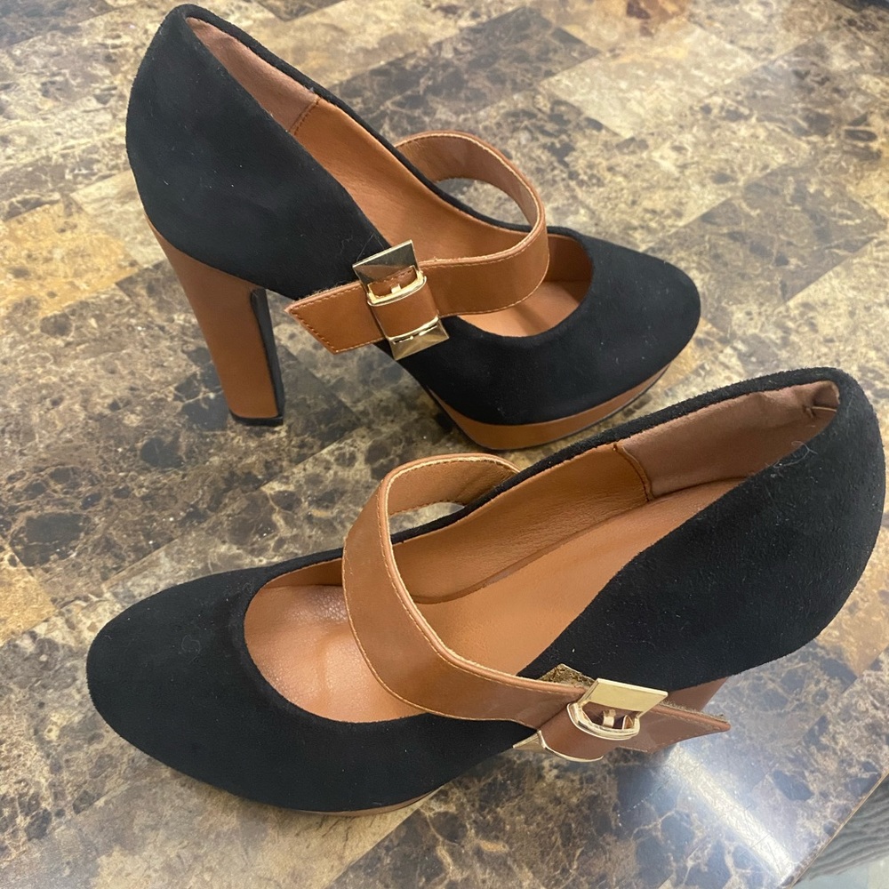 Black and brown pumps